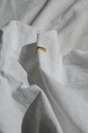 Earcuff fascia incrociata zirconi