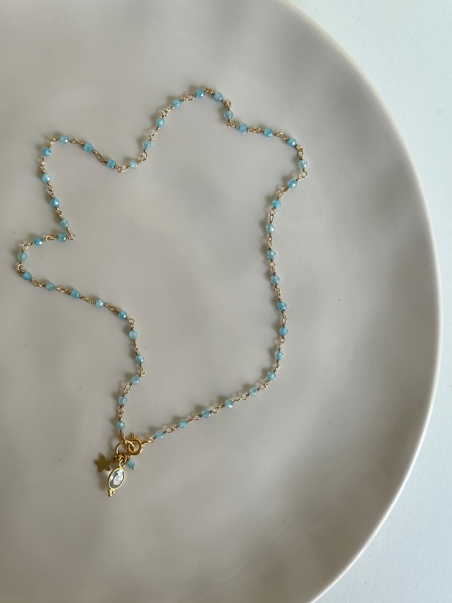 Girocollo gold zirconi celesti