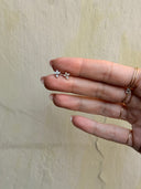 Piercing labret trifoglio con punto luce