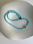 Collana turchese e occhietto