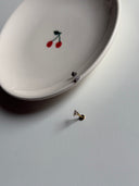 Piercing labret triangolino