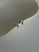 Piercing labret punto luce pendente