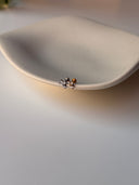 Piercing labret trifoglio con punto luce