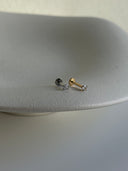 Piercing labret punto luce