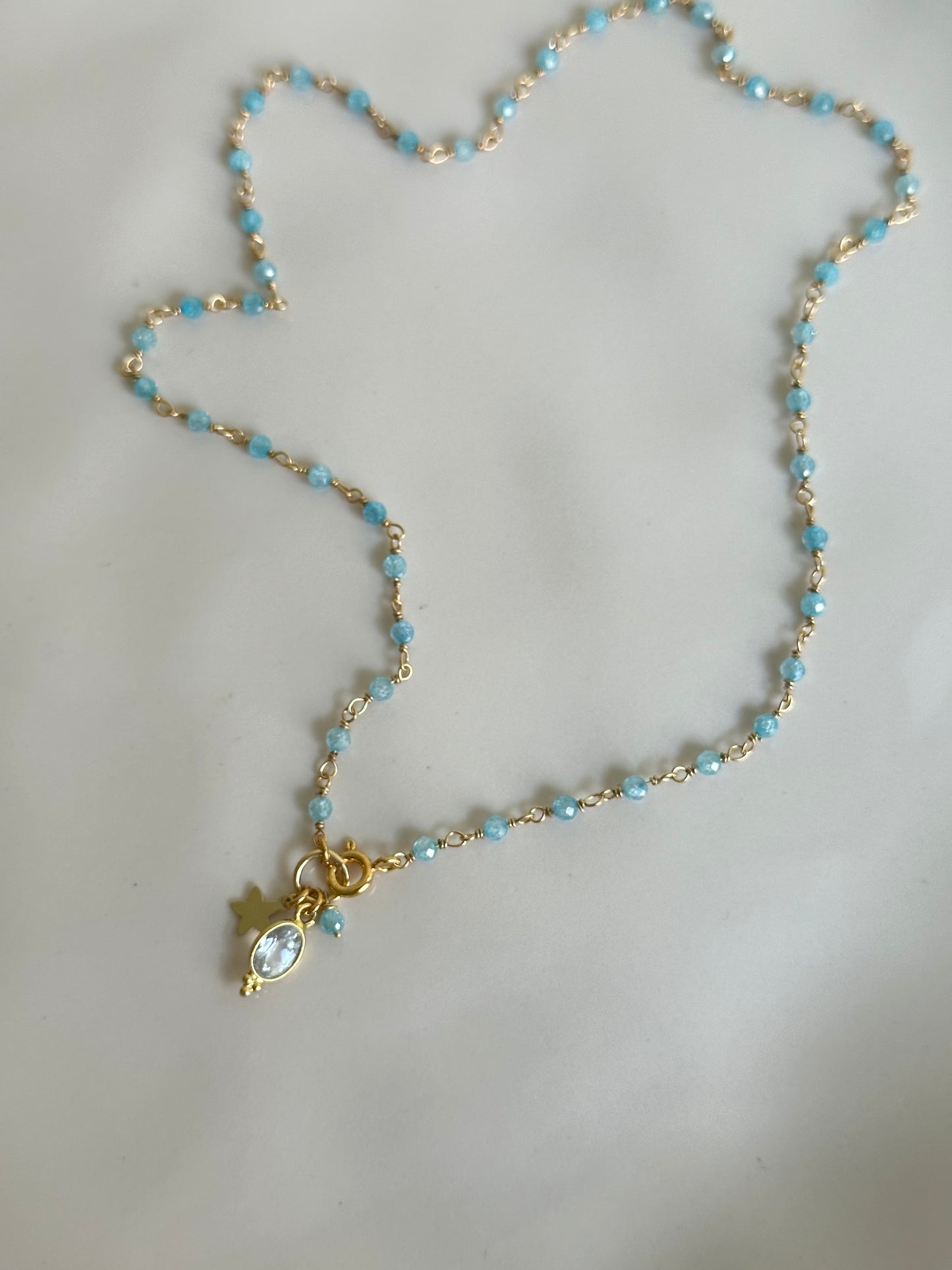 Girocollo gold zirconi celesti