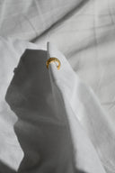Earcuff fascia incrociata zirconi