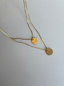 Collana con medaglietta incisa